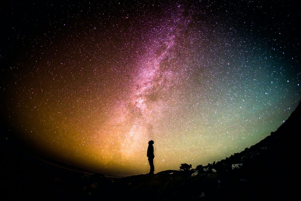 man standing under stars soul integration process