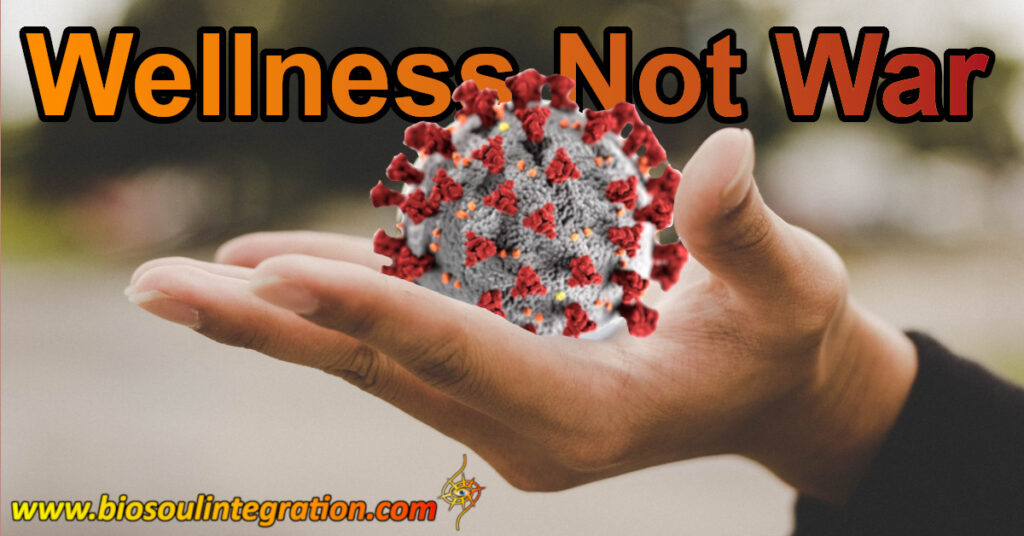hand holding a virus says wellness not war empower wellness