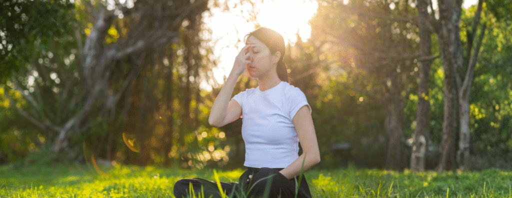 A woman meditating experiencing awakening